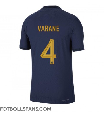 Frankrike Raphael Varane #4 Replika Hemmatröja VM 2022 Kortärmad